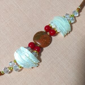 Bracelet with shells and leather